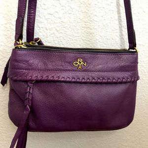 Oryany crossbody plum bag.